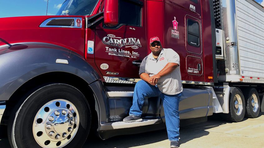 Carolina Tank Lines driver in front of climate controlled truck