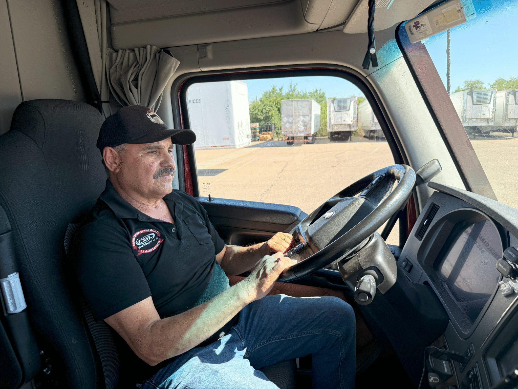 CGL Transport driver in truck cab