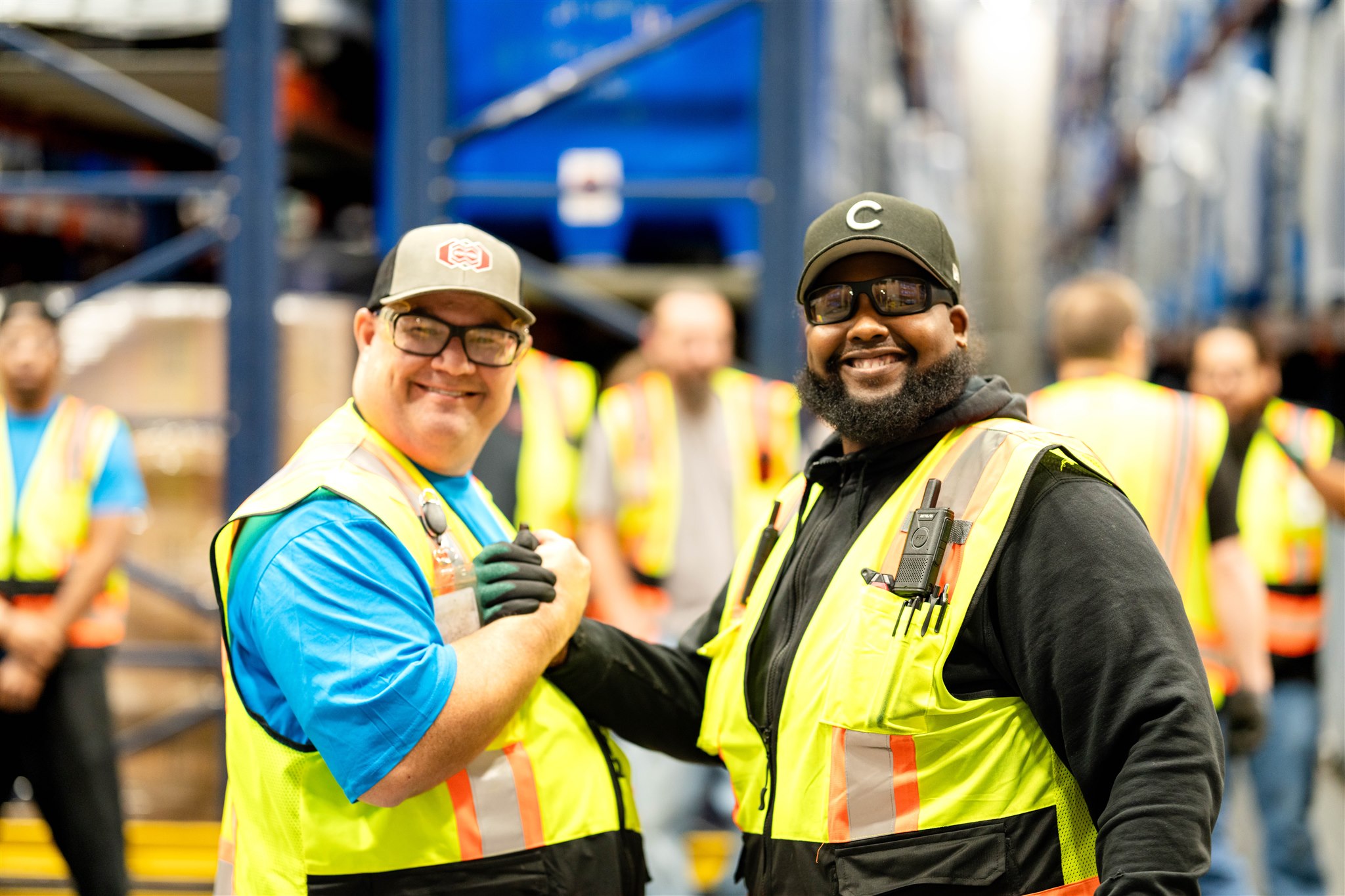 Two Rinchem employees giving shaking hands
